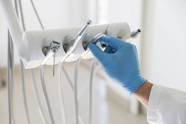 Professional Root Canal Treatment technician working in Steilacoom, WA